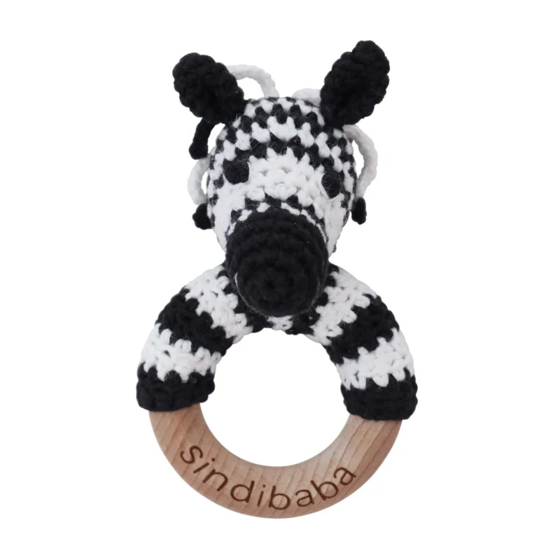 Zebra STRIPEY rattle ring with crocheted yarn surface and untreated beechwood ring, front view isolated