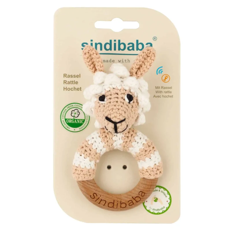 Rattle Ring Lama LUKE – Packaging Front Lama LUKE rattle ring with crocheted yarn surface in transparent packaging, front view for retail display