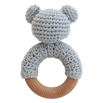 Koala ring rattle with tightly crocheted yarn and natural beechwood ring, back view isolated