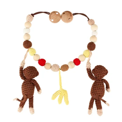 Crochet stroller chain Monkey CHARLIE made of organic cotton and wood, back view