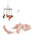 Collage zum gehäkelten Baby-Mobile WALDTIERE I mit einem auf dem Rücken liegenden Baby und Rassel-Icon