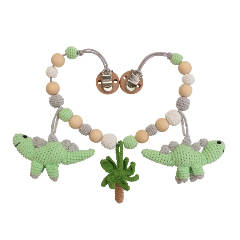 12393-stroller-chain-dinosaur-dino-back Gehäkelte Kinderwagenkette Dinosaurier DINO (Art.-Nr. 12393) als Produktfoto in der Vorderansicht.